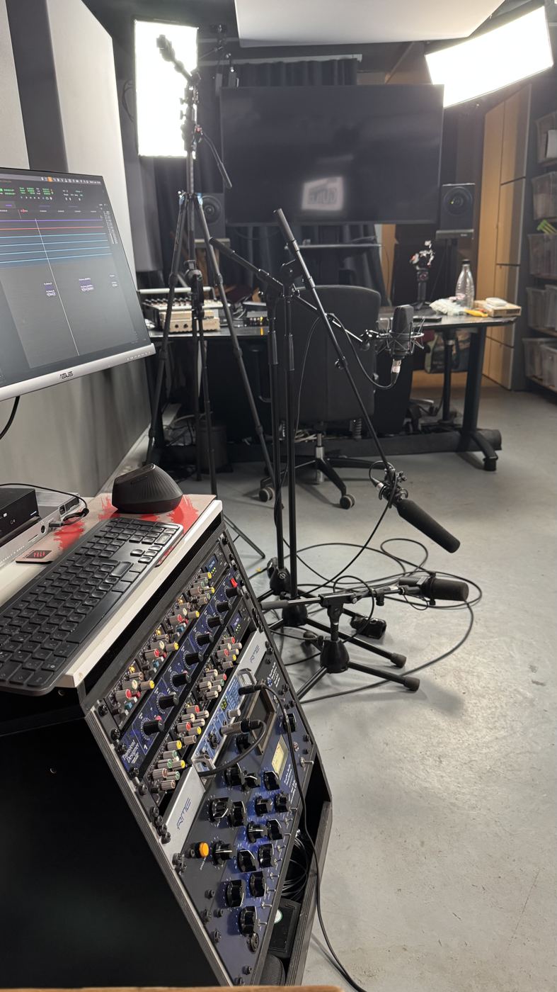 Microphones in front of the mixing desk